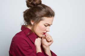 Beautiful,Girl,Coughing,Isolated,On,A,Gray,Background