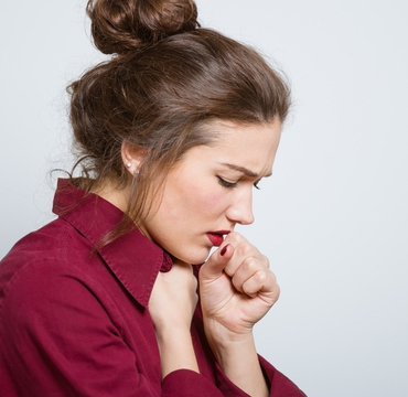 Beautiful,Girl,Coughing,Isolated,On,A,Gray,Background