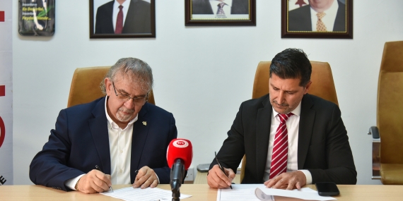 KKTC MOK ile AÖA arasında iş birliği protokolü imzalandı