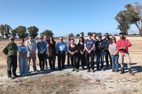 1782749075652Sevg-l-Uluda-with-CMP-employees-at-a-field-site.jpg