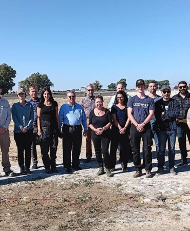 1782749075652Sevg-l-Uluda-with-CMP-employees-at-a-field-site.jpg